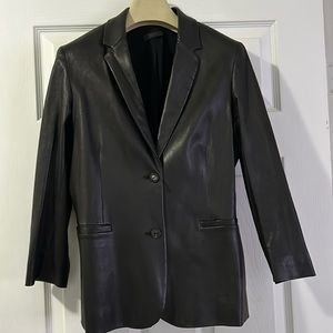 The Row lambskin leather blazer. Slit pockets, button closure, bracelet sleeve.